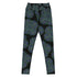 The front side of a pair of Xigfireon graphic yoga leggings featuring the Living Colour Black patterned series of the Reach Of The Spirit Celtic knot design.