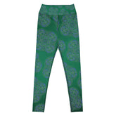 The front side of a pair of Xigfireon graphic yoga leggings featuring the Living Colour Forest patterned series of the Reach Of The Spirit Celtic knot design.