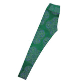 The left side of a pair of Xigfireon graphic yoga leggings featuring the Living Colour Forest patterned series of the Reach Of The Spirit Celtic knot design.