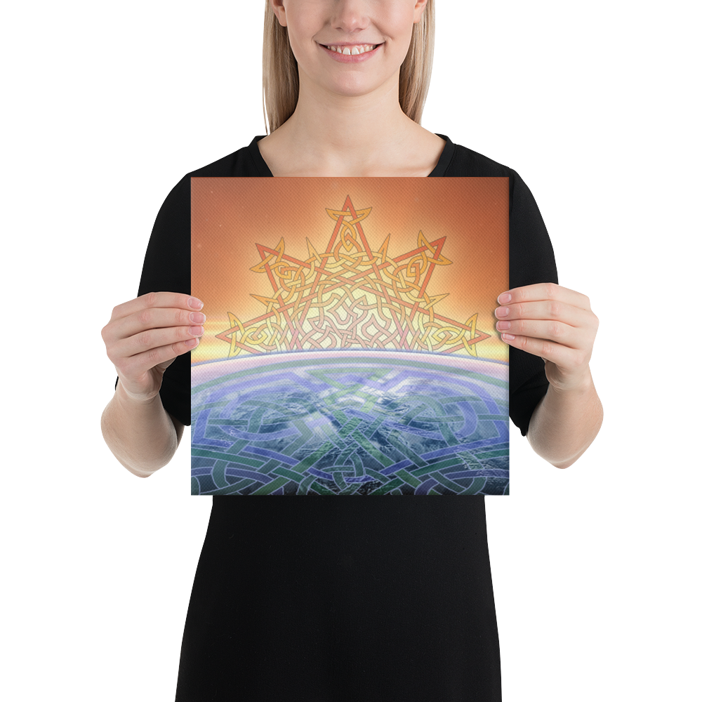 A young woman holding a 12 inch x 12 inch canvas print of the `Derivation II` Celtic knot design, which symbolizes the Sun and the Earth and their cosmic dance.