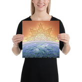 A young woman holding a 12 inch x 12 inch canvas print of the `Derivation II` Celtic knot design, which symbolizes the Sun and the Earth and their cosmic dance.