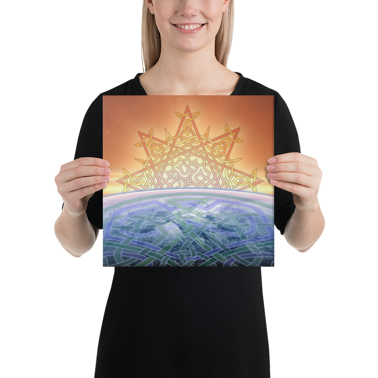 A young woman holding a 12 inch x 12 inch canvas print of the `Derivation II` Celtic knot design, which symbolizes the Sun and the Earth and their cosmic dance.