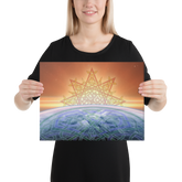 A young woman holding a 12 inch x 16 inch canvas print of the `Derivation II` Celtic knot design, which symbolizes the Sun and the Earth and their cosmic dance.