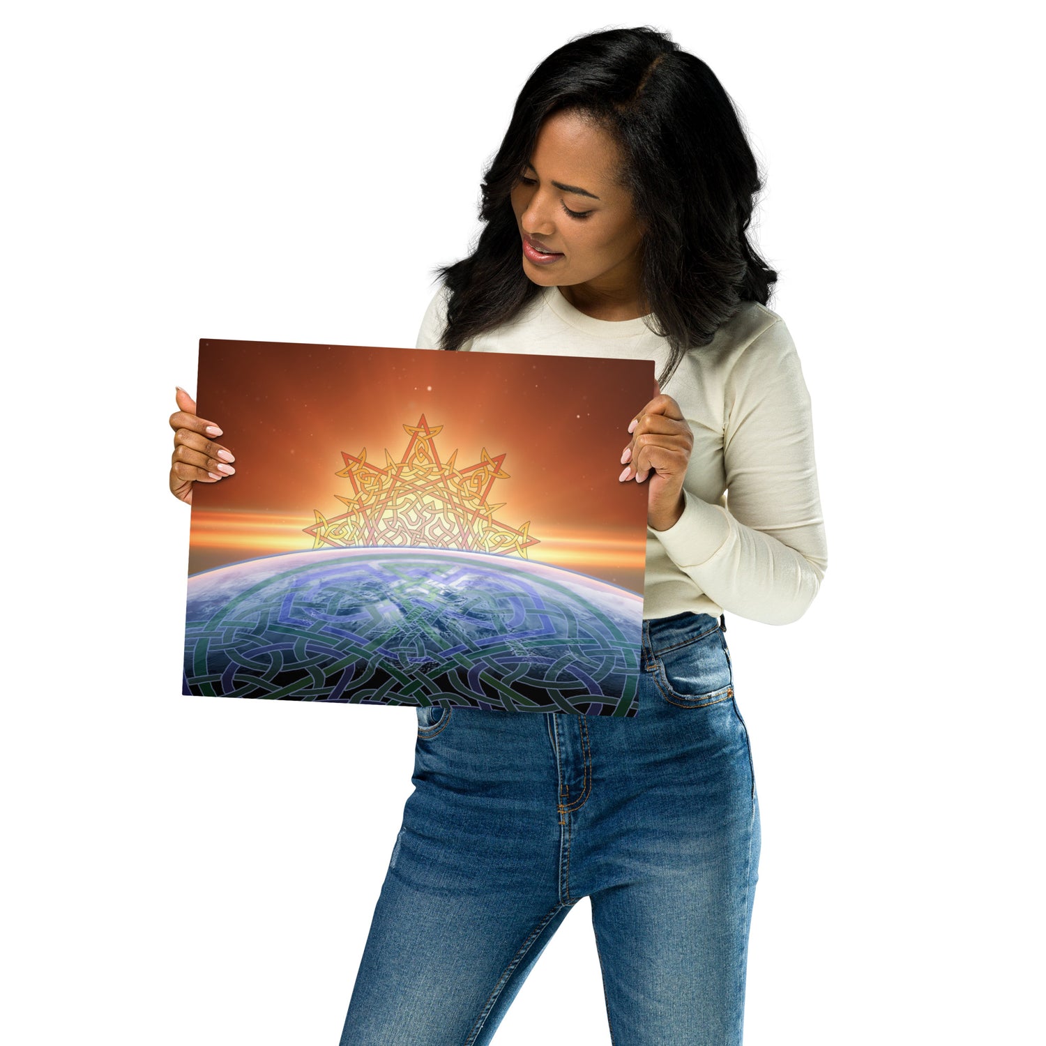 A young woman holding a Xigfireon 11 inch x 14 inch glossy metal print of the `Derivation II` Celtic knot design, which represents the Sun and the Earth in their cosmic dance.