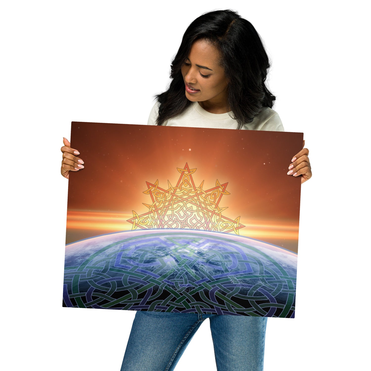 A young woman holding a Xigfireon 16 inch x 20 inch glossy metal print of the `Derivation II` Celtic knot design, which represents the Sun and the Earth in their cosmic dance.