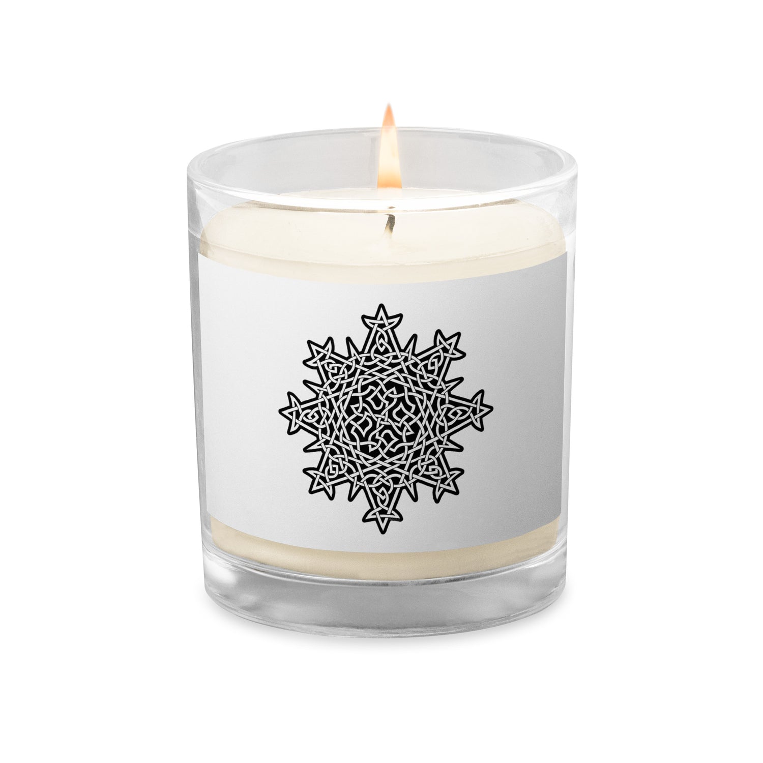 A Xigfireon glass jar soy wax candle featuring the Black & White Solid iteration of the `Morning Star Fire` Celtic knot design. The `Morning Star Fire` Celtic knot symbolizes Father Sun.