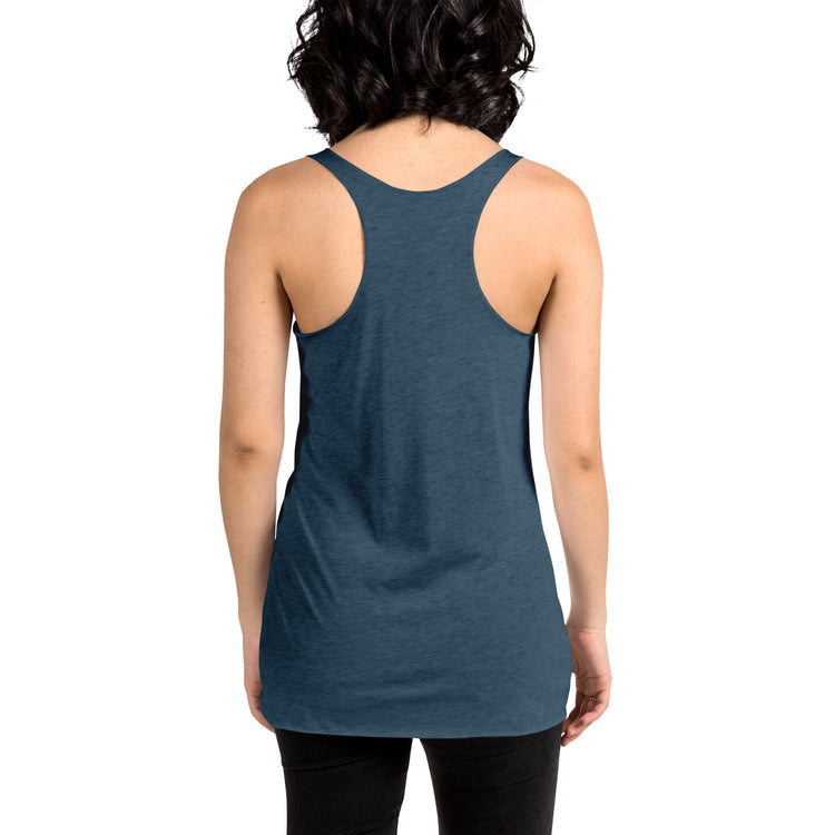 A young woman, viewed from behind, wearing an indigo Xigfireon graphic women&