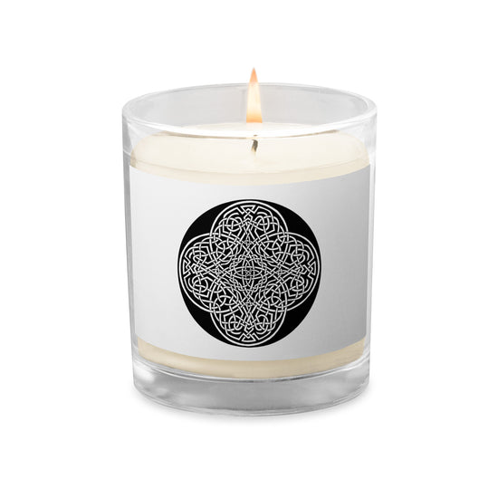 A Xigfireon glass jar soy wax candle featuring the Black & White Circle iteration of the `Reach Of The Spirit` Celtic knot design. The `Reach Of The Spirit` Celtic knot symbolizes Mother Earth.