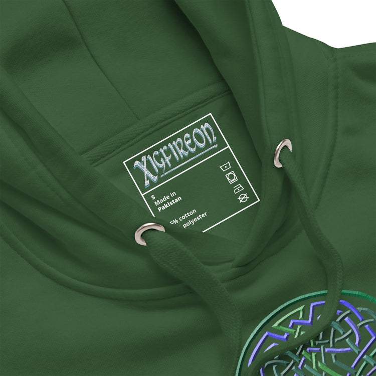 A close-up view of a forest green Xigfireon graphic hoodie featuring the Living Colour iteration of the `Reach Of The Spirit` Celtic knot design. The `Reach Of The Spirit` Celtic knot symbolizes our wonderful Mother Earth.