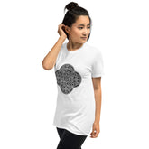 A young woman wearing a white Xigfireon graphic t-shirt featuring the Black & White Solid iteration of the `Reach Of The Spirit` Celtic knot design. The `Reach Of The Spirit` Celtic knot symbolizes Mother Earth.