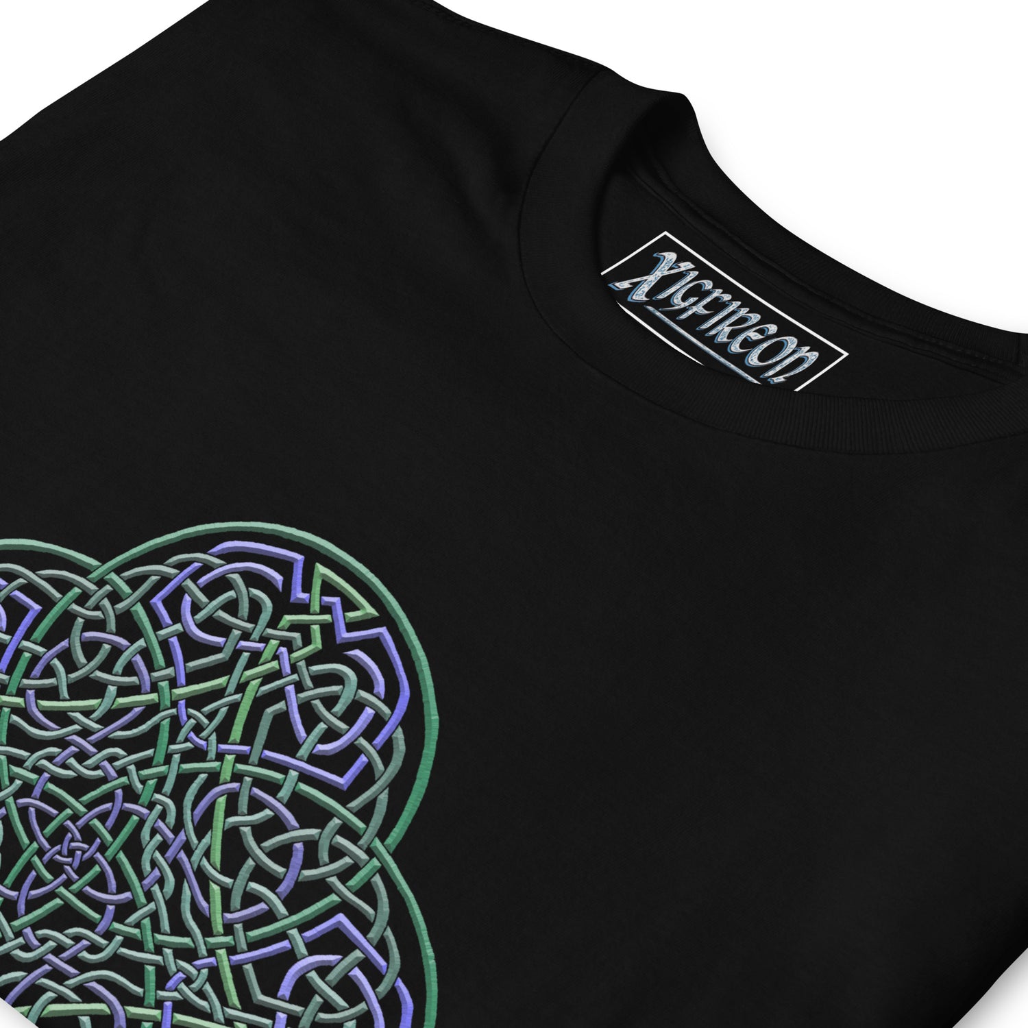 A close-up view of a black Xigfireon graphic t-shirt featuring the Living Colour iteration of the `Reach Of The Spirit` Celtic knot design. The `Reach Of The Spirit` Celtic knot symbolizes the Earth.