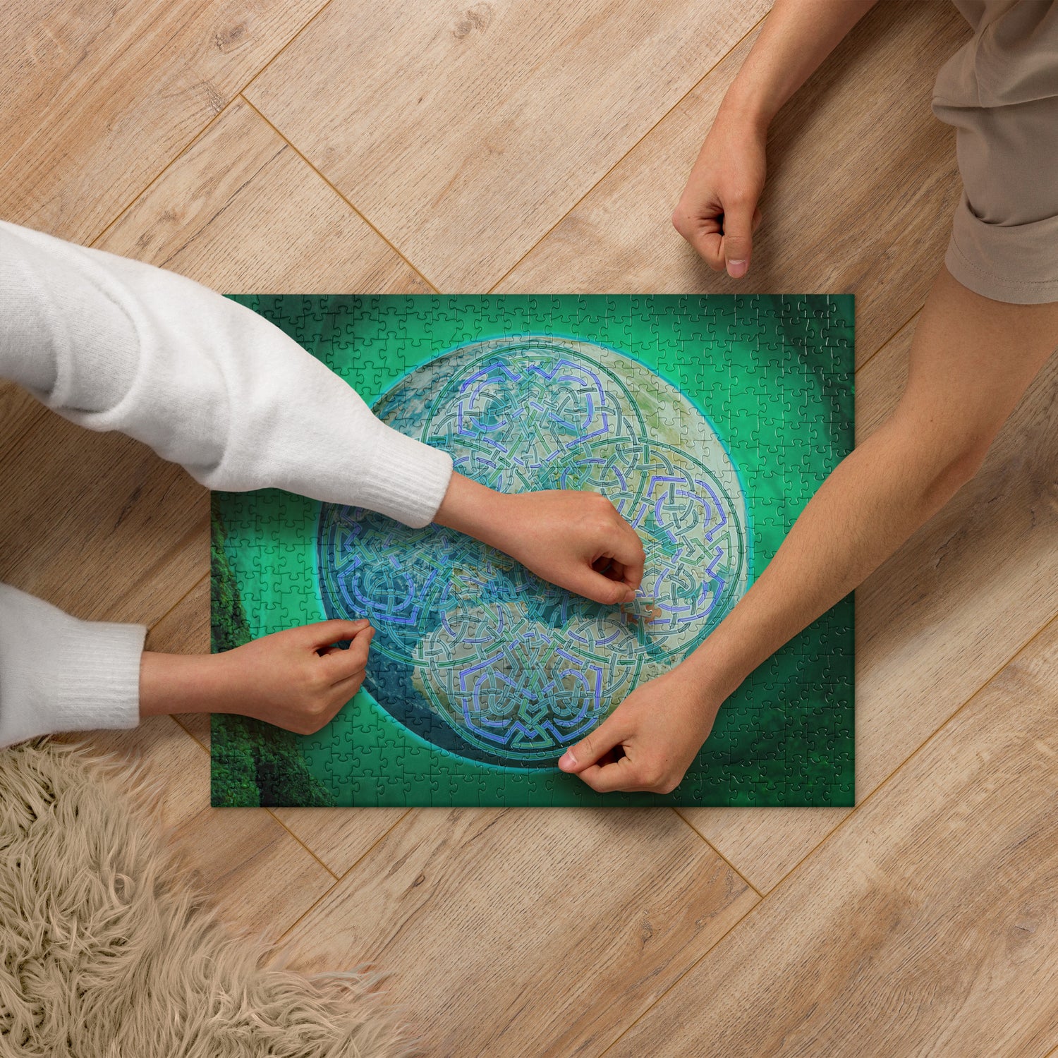 A couple of kids shown working on a 520 piece jigsaw puzzle featuring the Deep Forest iteration of the `Reach Of The Spirit` Celtic knot design. The `Reach Of The Spirit` Celtic knot represents Mother Earth.