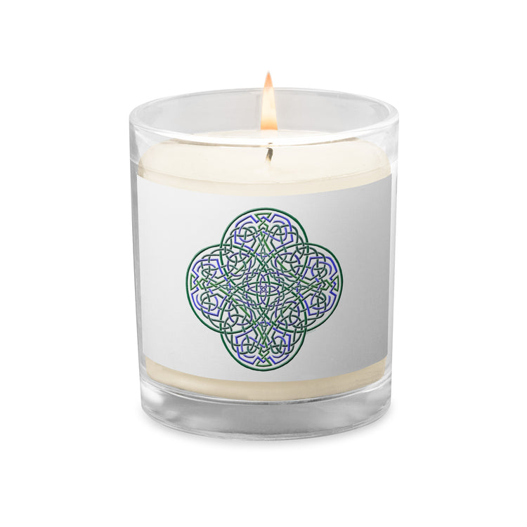 A Xigfireon glass jar soy wax candle featuring the Living Colour iteration of the `Reach Of The Spirit` Celtic knot design. The `Reach Of The Spirit` Celtic knot symbolizes Mother Earth.